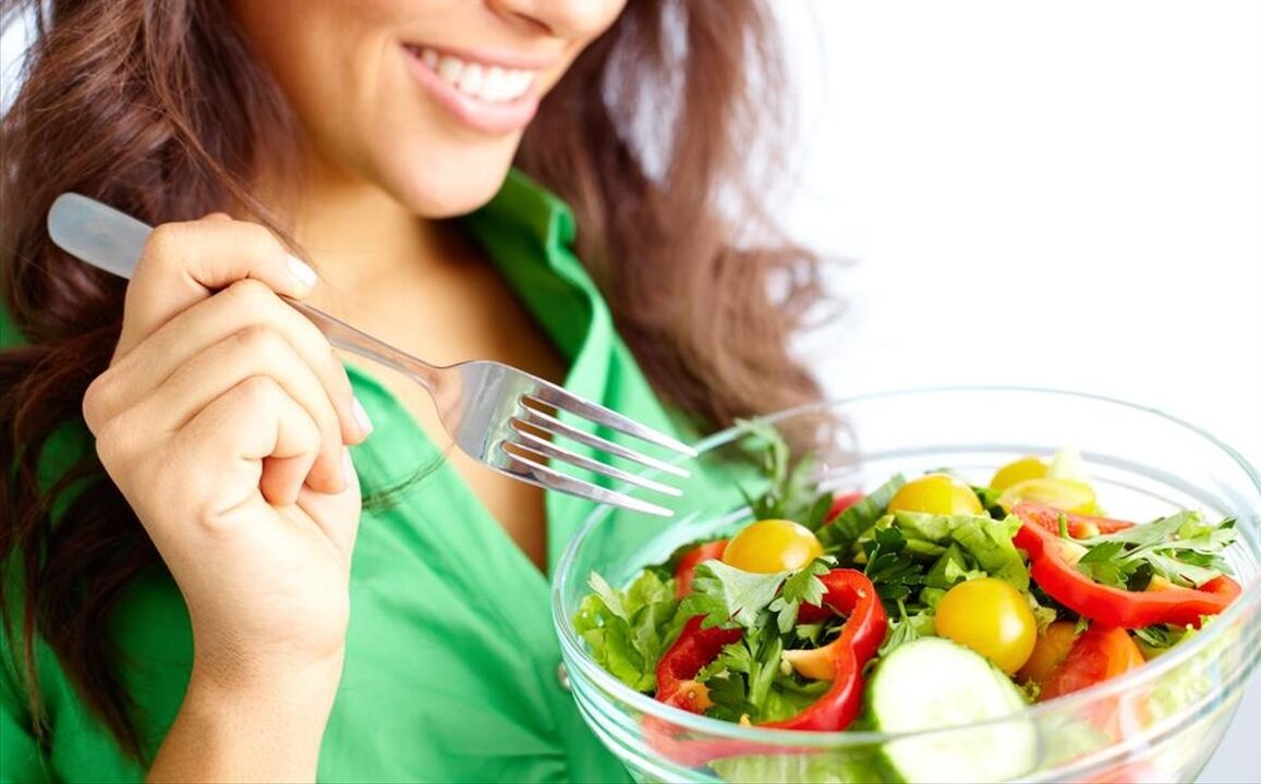 girl eating vegetable salad on a 6-petal diet